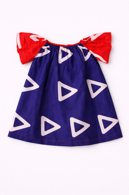 Blue dress with white triangle patterns and red sleeves on a white background
